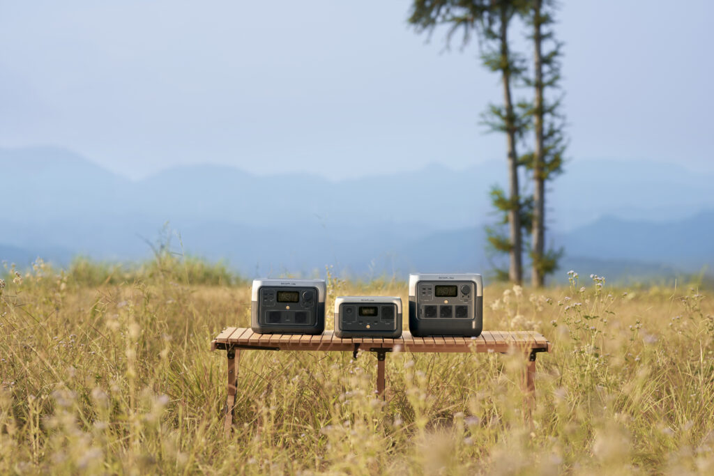 A picture of three EcoFlow's River series batteries outdoor.